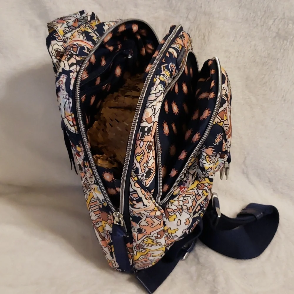Vera Bradley Women's‎ Performance Twill Utility sling backpack.